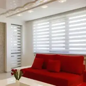Premium window coverings in a modern living room - winlor custom blinds and shades
